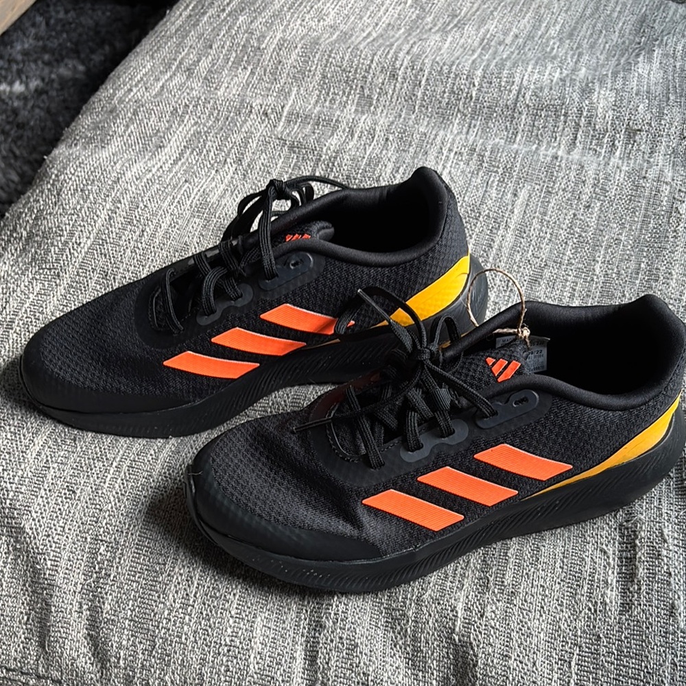 Adidas Black Sneakers with Orange and Yellow Accents